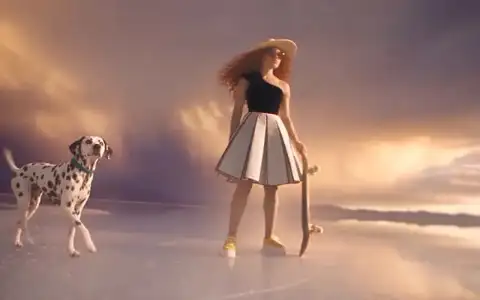 Change Only X Fashion, step 06: a freckled model with copper curls in a cream straw boater, cat-eye sunglasses and a black and ivory velvet pleated dress stands with her skateboard on a mirror salt flat at sunset, a Dalmatian at her side