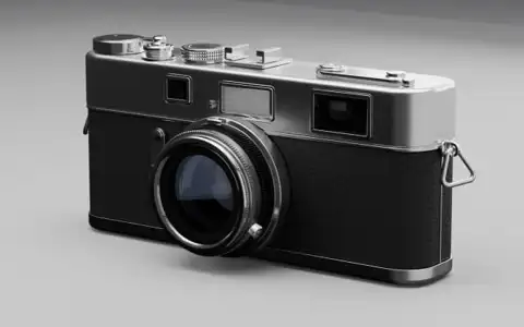 A chrome and black-leather rangefinder camera rendered in Blender, its silver lens rings and dials catching soft studio light